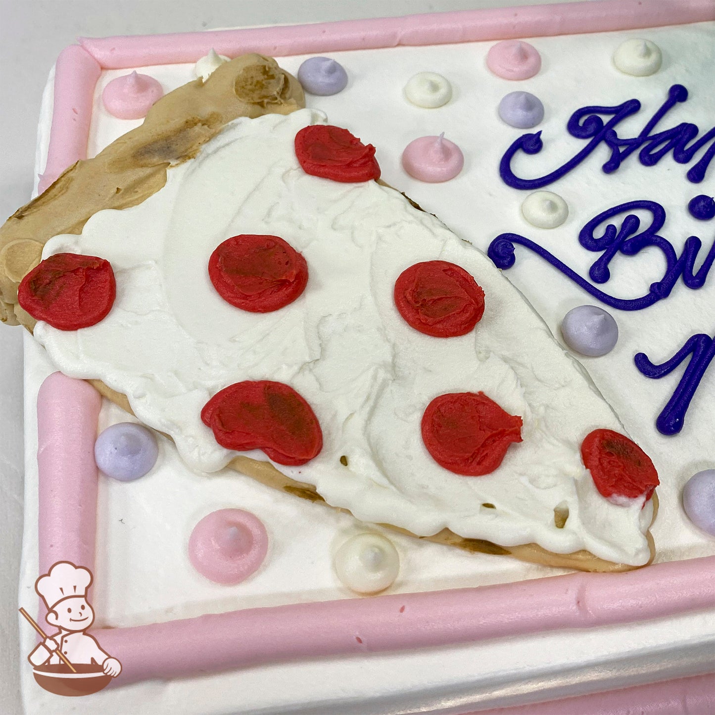 A sheet cake with pink buttercream borders, pink, purple and ivory dots, decorated with a large slice of pizza made of icing, featuring red pepperoni and white cheese details.