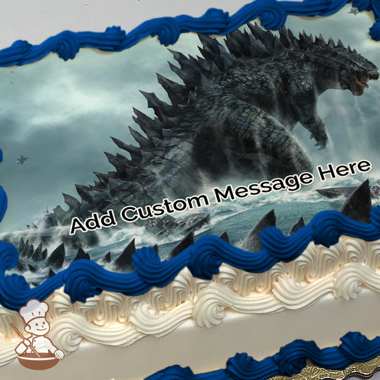 Godzilla roaming through the ocean printed on extra cake layer and decorated on sheet cake.