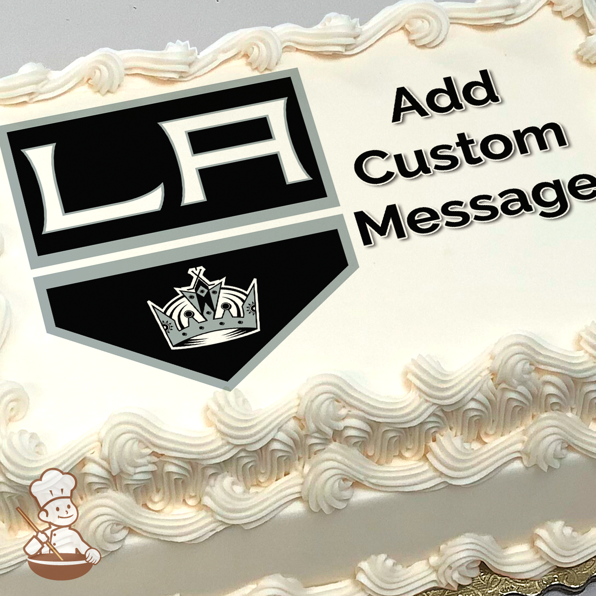Los Angeles Kings hockey team logo with a crown beneath, on a sheet cake.