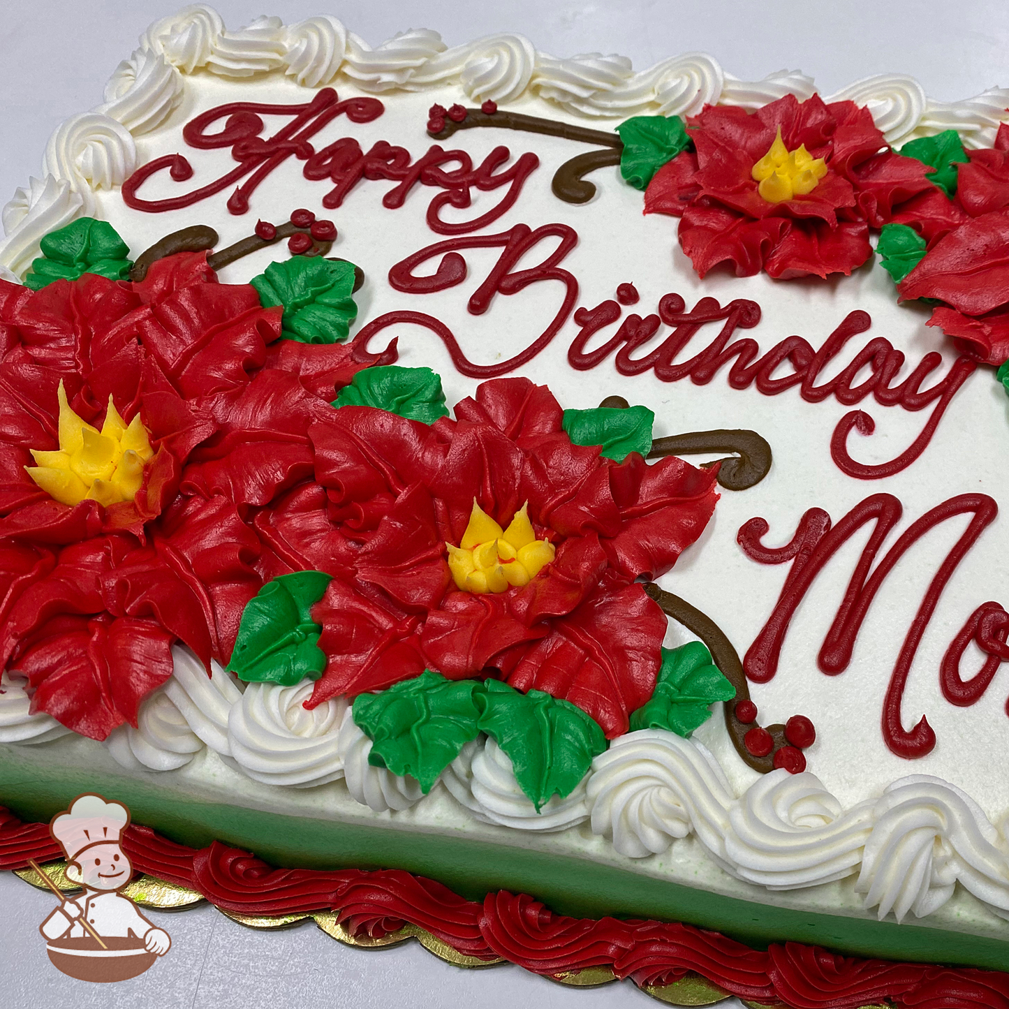 Birthday sheet cake with buttercream poinsettias.