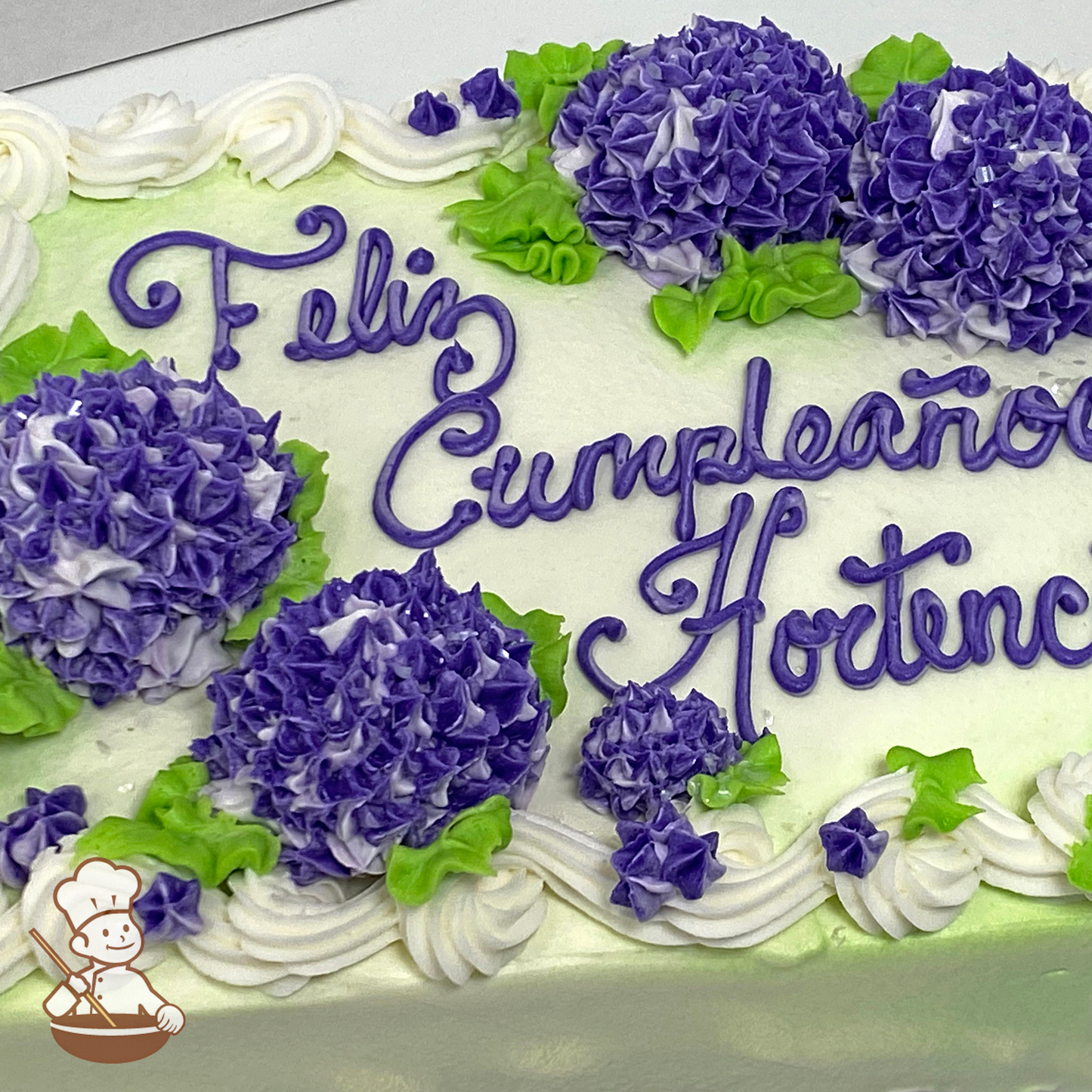 Birthday sheet cake with buttercream hydrangeas.