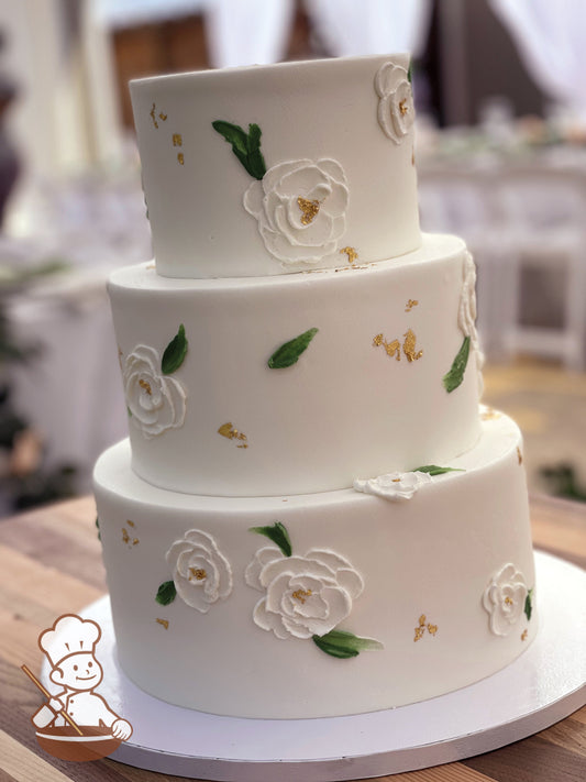 3 Tier buttercream wedding cake with oil painting styled floral design and gold leaf accents.