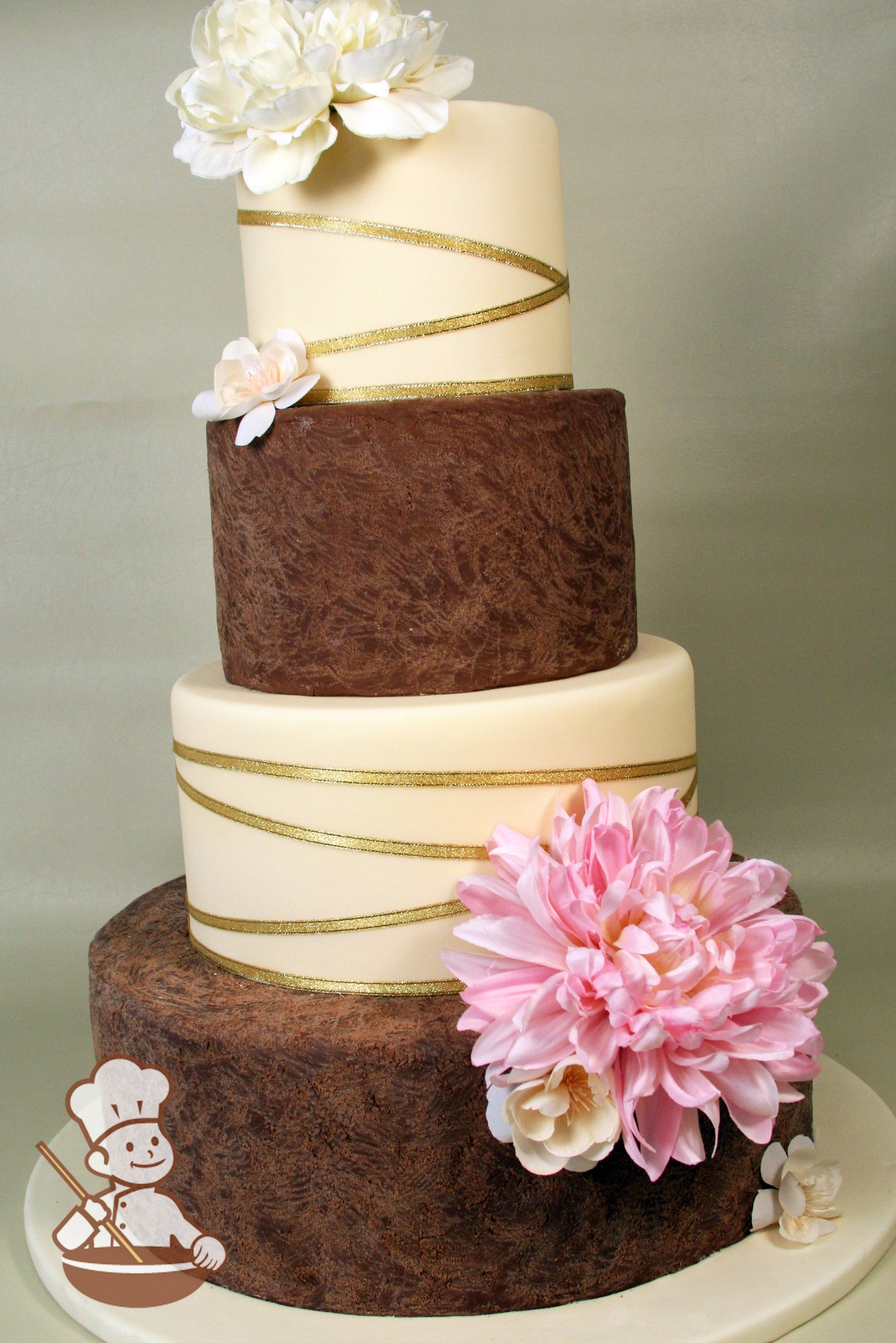 4 tier fondant wedding cake with alternating smoth ivory and textured chocolate brown tiers with gold ribbon accents.