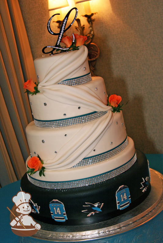 Bottom tier cake looks like a hockey puck with images of Shark logo and jerseys. Top 3-tier with fondant drapes, rhinestones and teal bands.