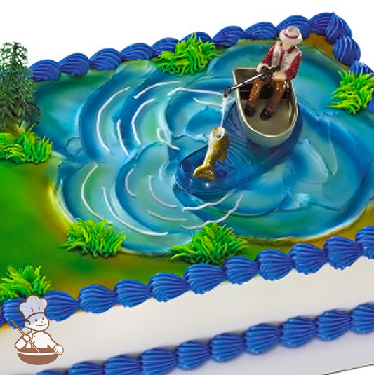 Birthday sheet cake with buttercream lake and fishman in boat catching fish toy.