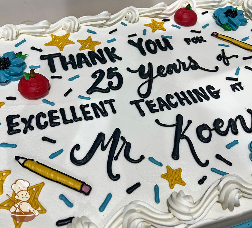 Sheet cake with white buttercream frosting, decorated with red apple designs, blue flowers, yellow stars, a yellow pencil, and blue and black sprinkles.