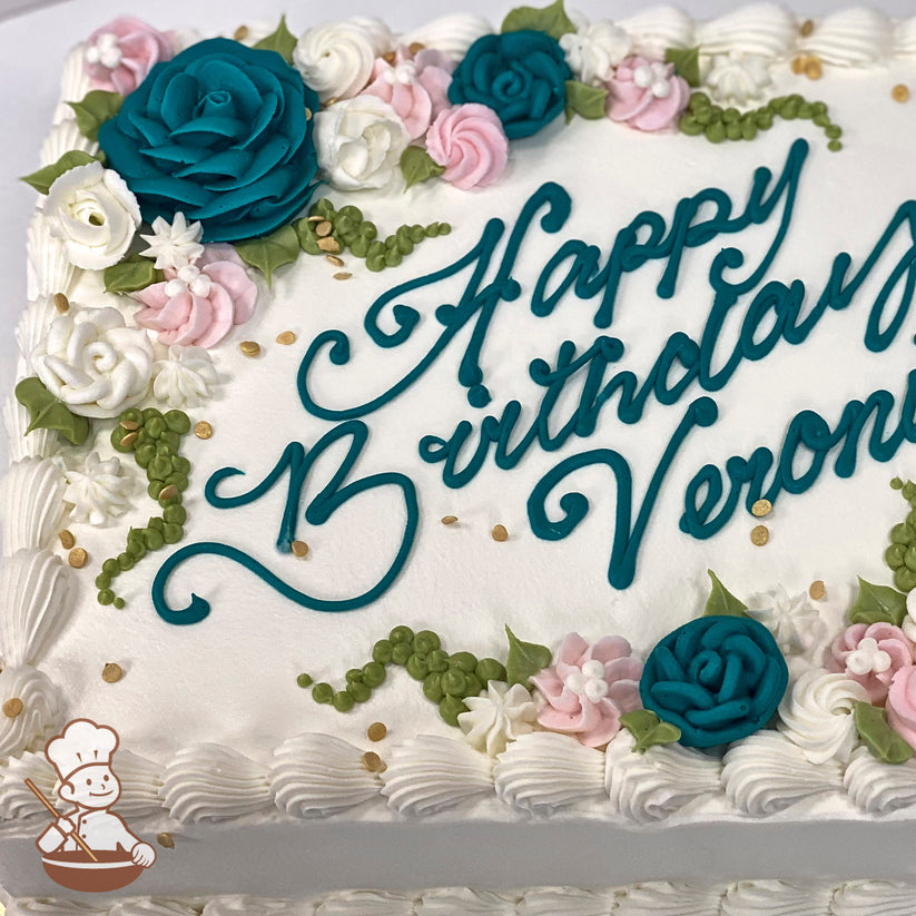 Sheet cake with teal, pink, and white buttercream florals, green leaves, and string of pearls. Gold sprinkles accent the floral design.