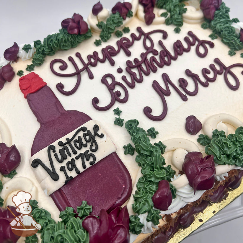 Sheet cake with buttercream decorations featuring a purple wine bottle and green vines.