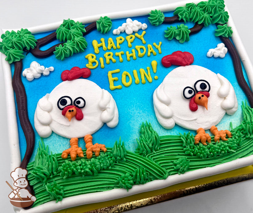 Sheet cake with buttercream decorations featuring two cartoon chickens, green grass, trees, and white clouds on a blue sky background.