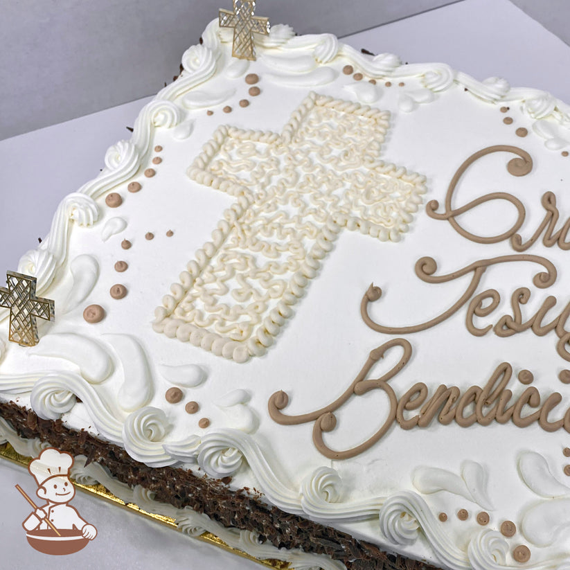 Sheet cake with a buttercream Cornelli lace cross, surrounded by swirls and dots. Two plastic cross rings are placed on the cake.