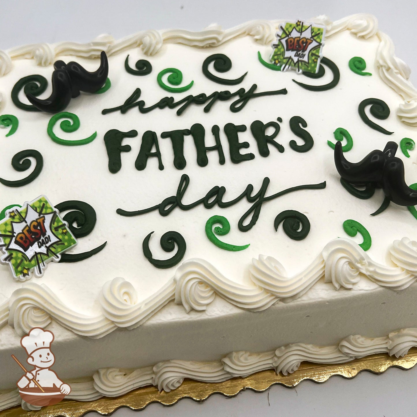 Sheet cake with white frosting, green scroll decorations, plastic black mustache toppers, and "Best Dad" comic-style plastic decorations.