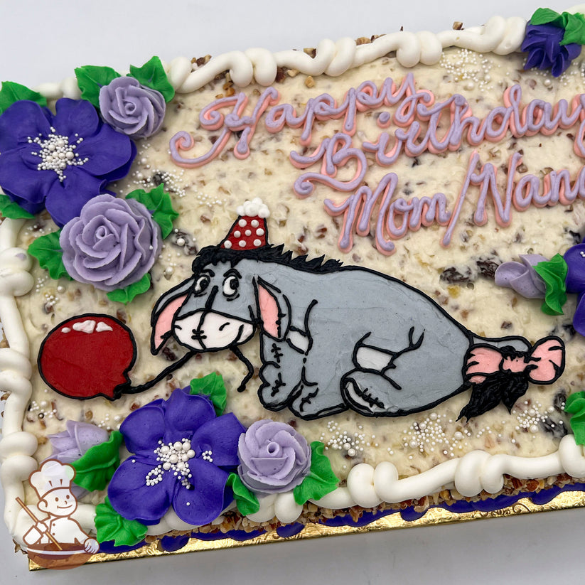 Sheet cake with a hand-piped Eeyore holding a red balloon, surrounded by purple and lavender buttercream flowers with green leaves and white pearl accents.