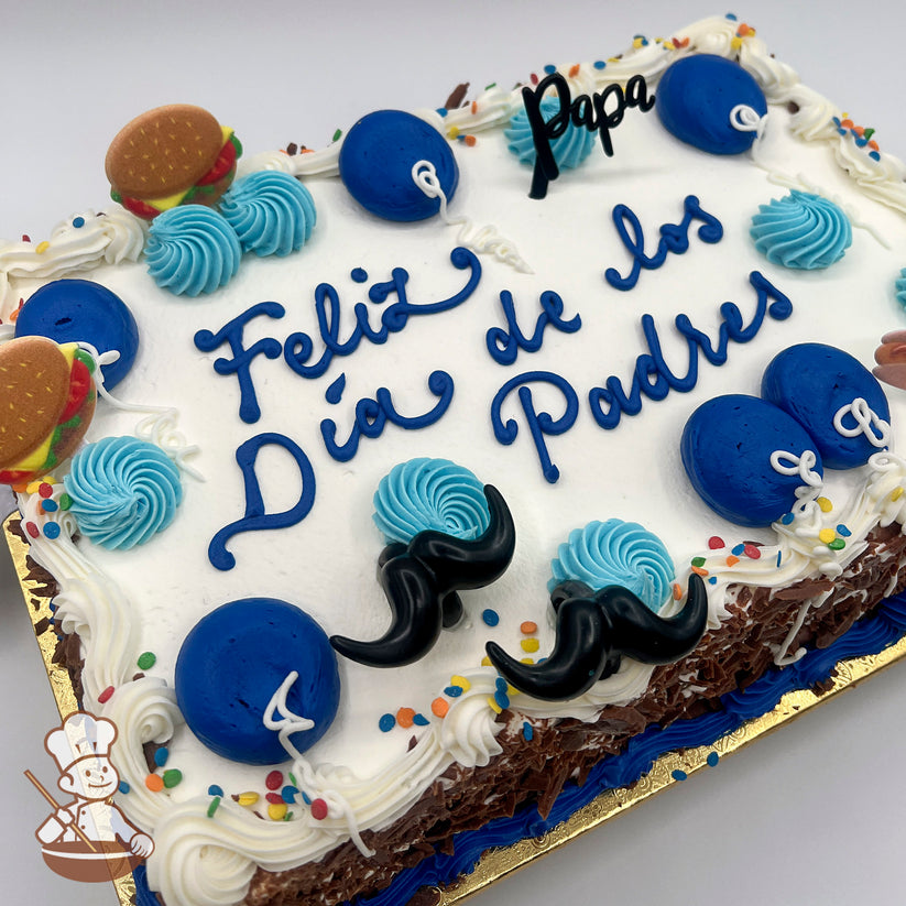 Sheet cake with white frosting, blue hand-piped swirlettes, blue balloons, plastic mustaches, plastic hamburger rings, and colorful sprinkles.