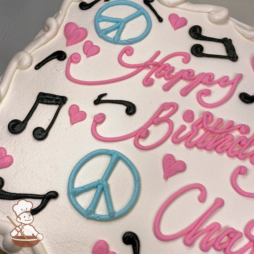 Sheet cake with buttercream decorations, featuring hand-piped blue peace signs, black music notes, and pink hearts on a white background.