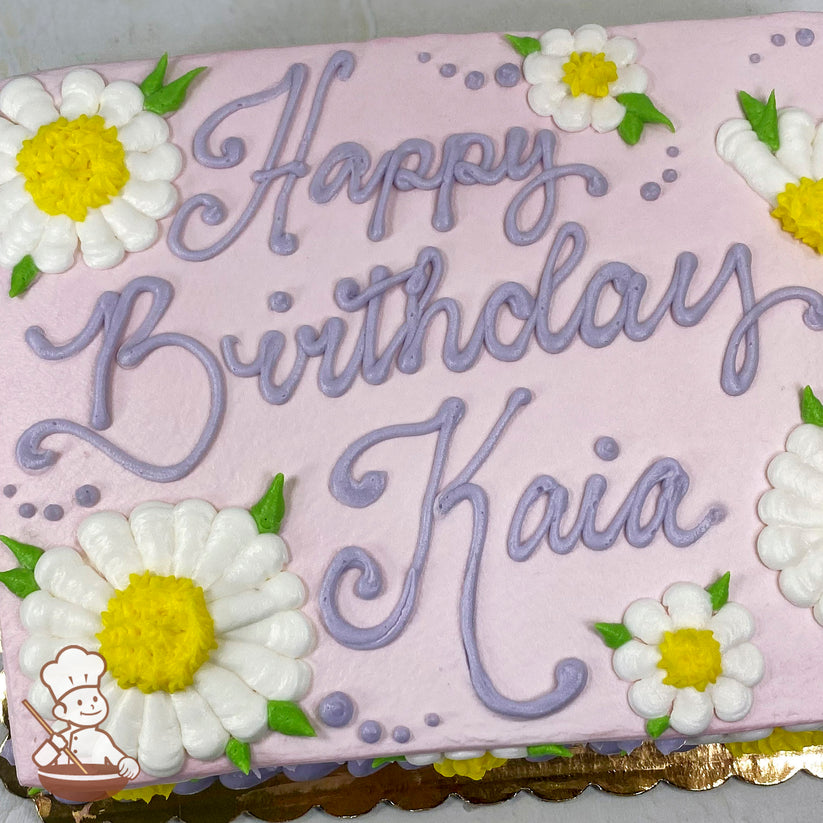 Pink sheet cake with white and yellow buttercream daisy decorations, green leaves, and purple piped details.
