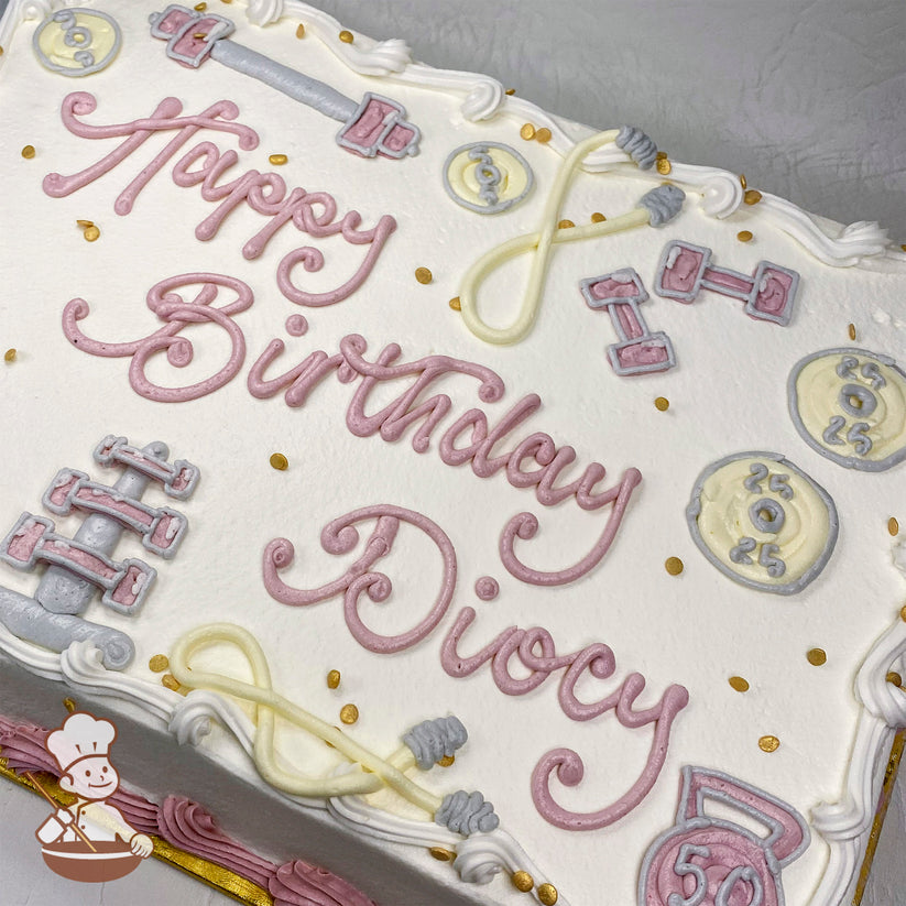 Sheet cake with white frosting, decorated with pink and yellow buttercream gym-themed designs, including dumbbells, weight plates, a jump rope, and a kettlebell. Gold sprinkles are scattered on top.