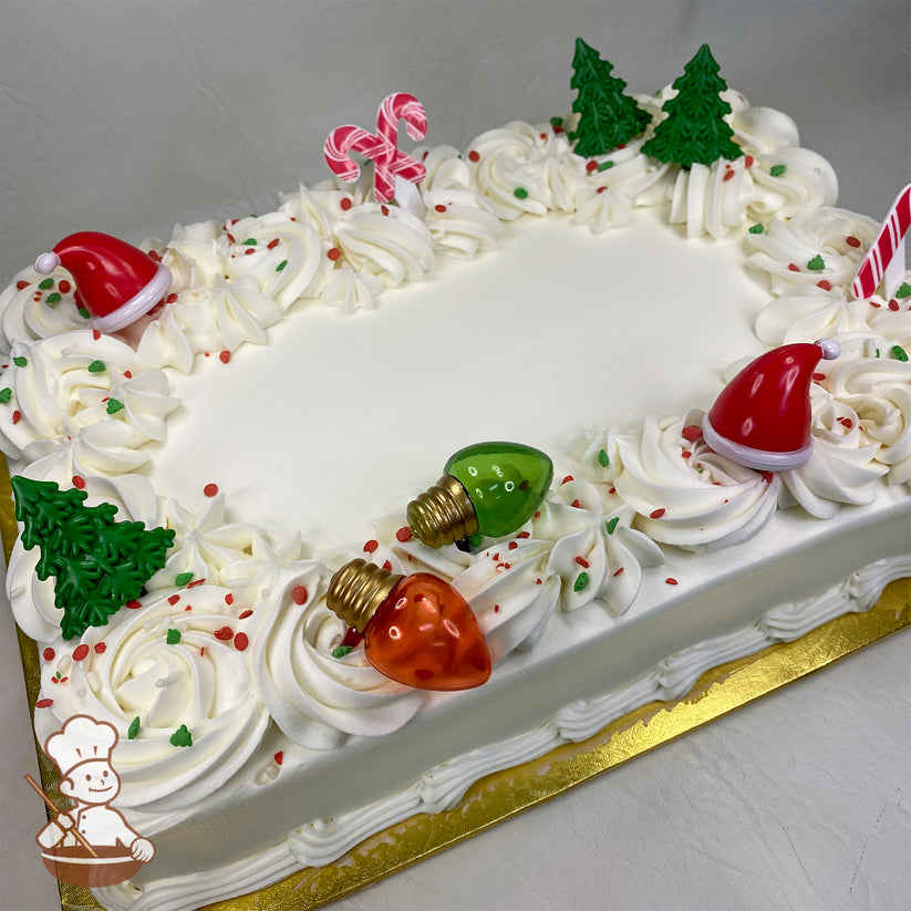 Sheet cake with buttercream rosette swirls, holiday sprinkles, plastic Christmas trees, Santa hats, candy canes, and light bulb decorations.