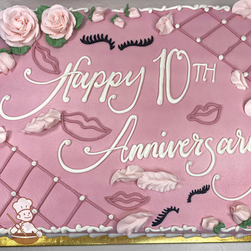 Pink sheet cake with buttercream roses, piped lips, eyelashes, and feathers. Decorative lattice design with dot accents on the edges.