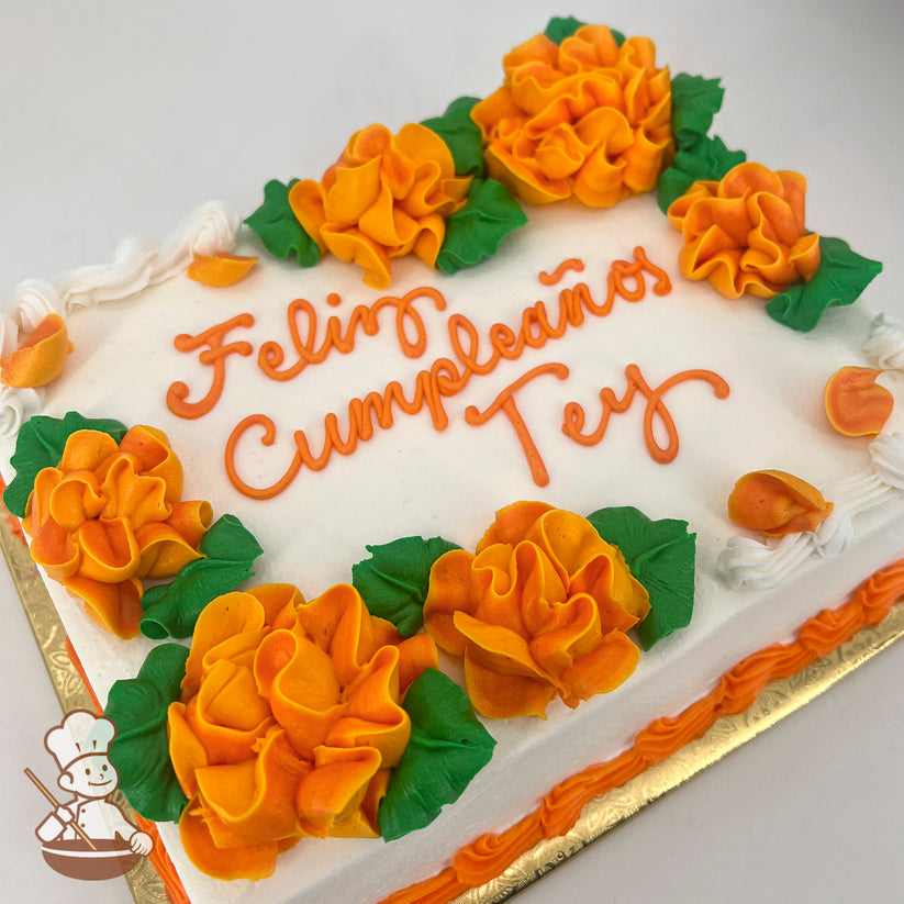 Sheet cake with orange buttercream marigolds and green leaves, bordered with orange and white icing.