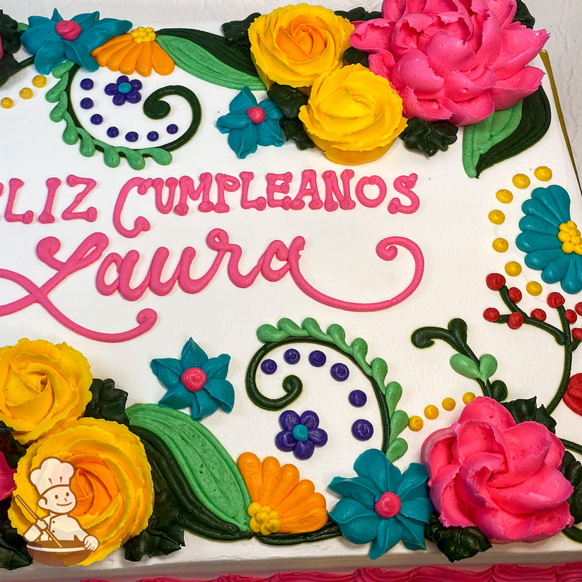 Sheet cake with buttercream decorations, featuring pink roses, yellow roses, blue flowers, green vines, colorful dots, and leaves.
