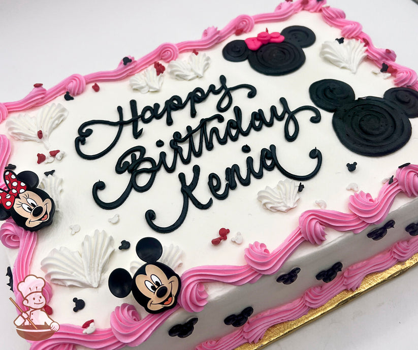 Sheet cake with pink buttercream border, Mickey and Minnie Mouse plastic rings, black Mickey and Minnie Mouse silhouettes, white buttercream hearts, and Mickey sprinkles.