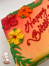 Ombre sheet cake with red, orange, and yellow buttercream hibiscus flowers, green leaf accents, and a gradient background of red, orange, and yellow.