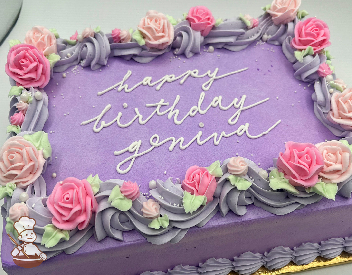 Purple sheet cake with pink and light pink buttercream roses, lavender swirl trim, and small sugar white pearls.