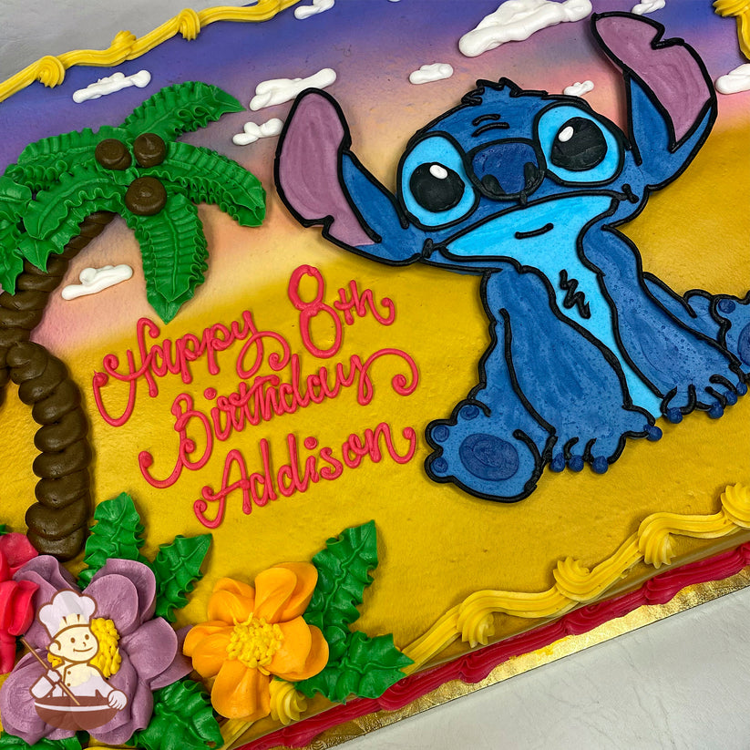 Sheet cake with a buttercream design of Stitch sitting on a yellow and purple sunset background, a palm tree, and colorful Hawaiian flowers in the corner.