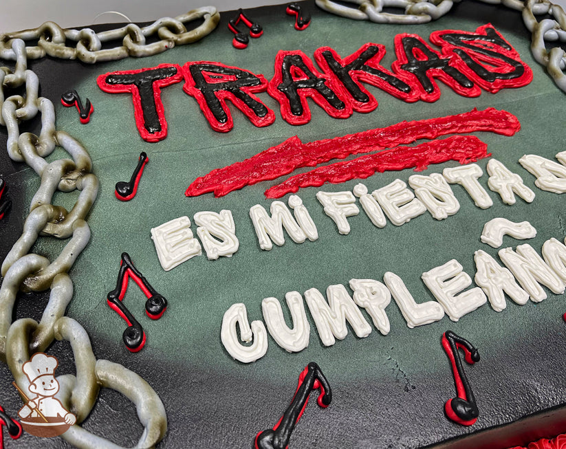 Sheet cake with buttercream chains and music notes. Red and black accents highlight the design.