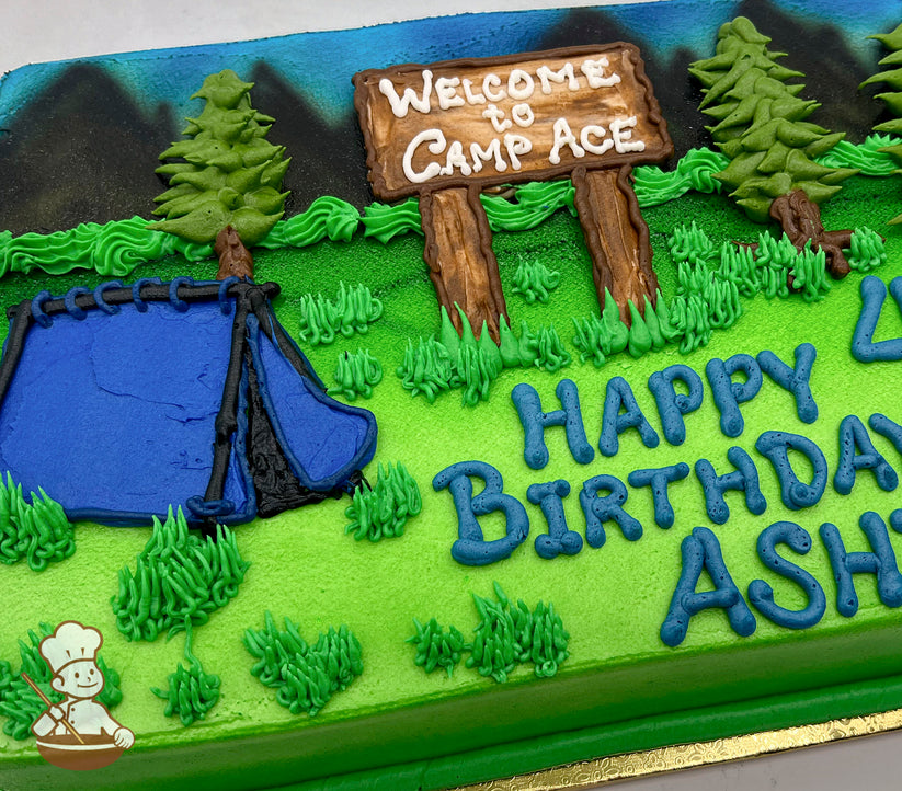 Sheet cake with buttercream decorations of a blue tent, green grass, trees, and a wooden sign reading "Welcome to Camp Ace" on a gradient green and blue background.