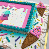 Sheet cake with a purple and teal buttercream border, decorated with ice cream cone designs in pink frosting, colorful sprinkles, and a printed photo layer.