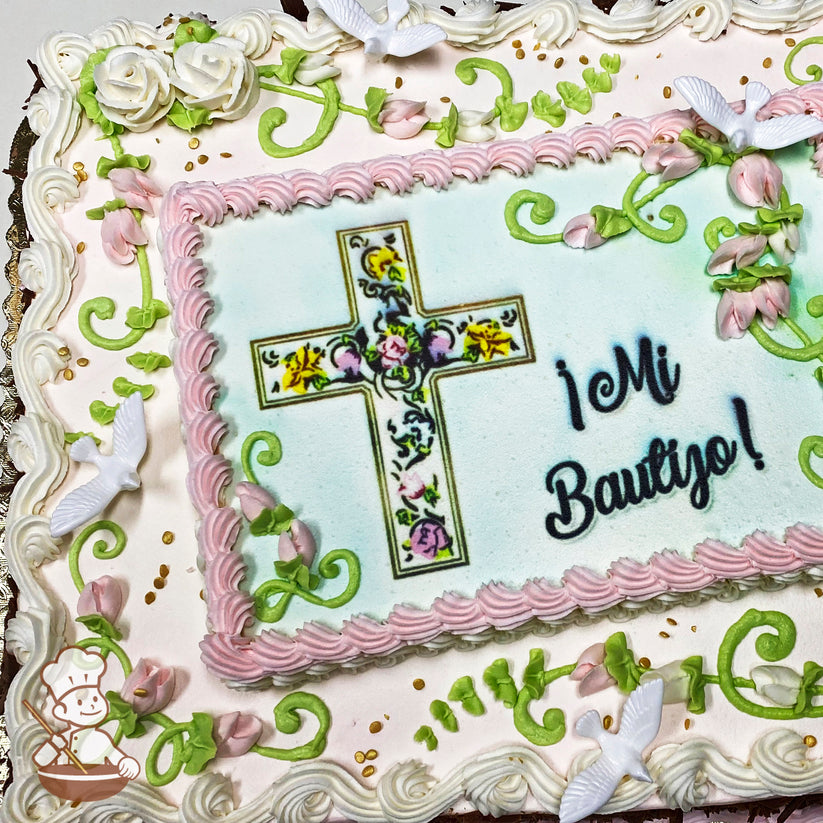 Sheet cake with pink and white buttercream borders, green vine accents, pink rosebuds, white plastic doves, and gold sprinkle decorations.