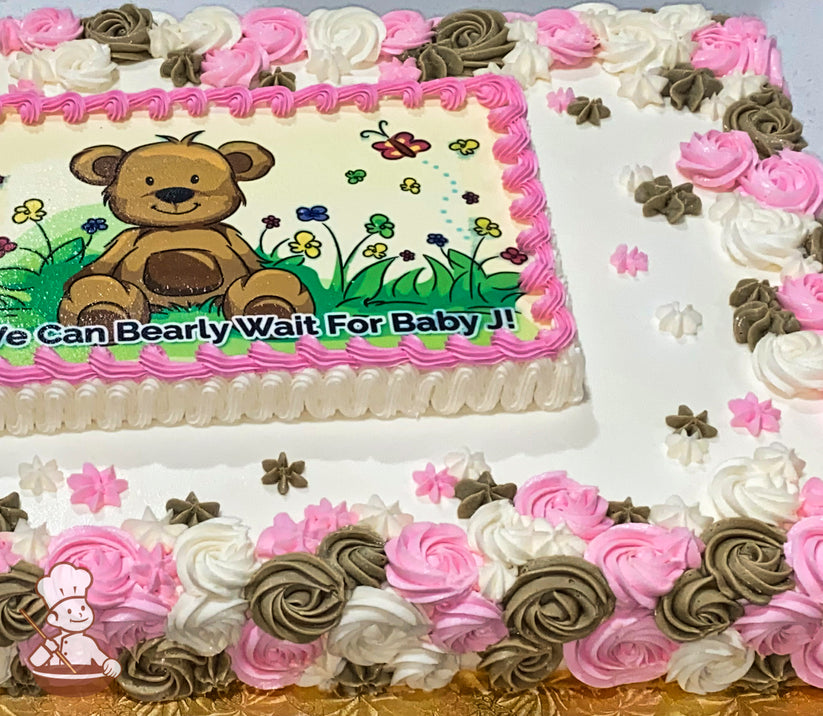 Sheet cake with pink, white, and brown buttercream rosettes, partial wrap design, and a printed photo layer.