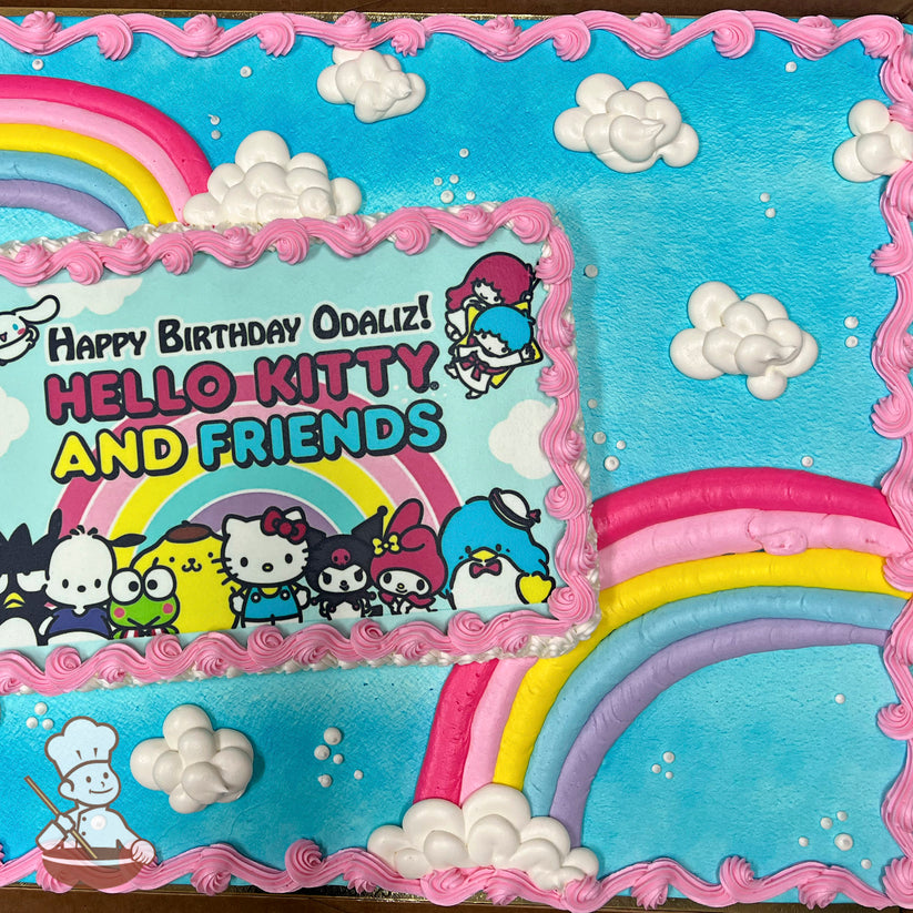 Sheet cake with a blue background, white buttercream clouds, colorful rainbows, and a pink buttercream border.