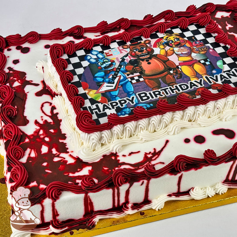 Sheet cake with white frosting, red buttercream borders, and red drip designs resembling blood stains. Printed photo layer framed with red piping.