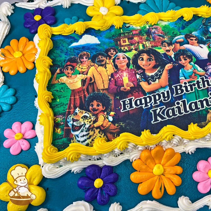 Sheet cake with colorful buttercream daisy flowers, including yellow, orange, pink, blue, and purple daisies, surrounding a printed photo layer.
