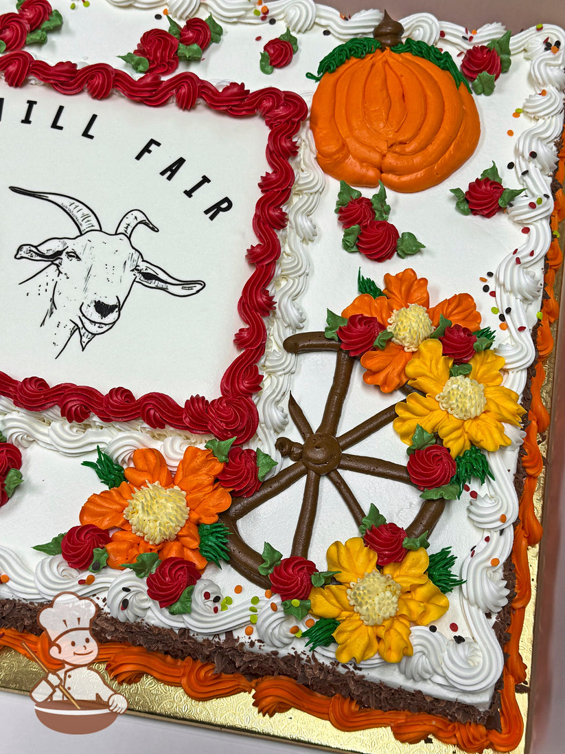 Sheet cake with buttercream decorations, featuring orange and yellow flowers, red swirls, and orange pumpkins. A brown wheel design is also present.