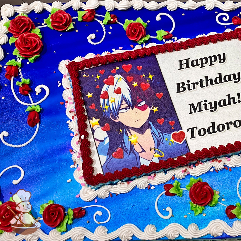 Sheet cake with red roses and green leaves on a blue background, white scrolls, and a printed photo layer bordered in red.