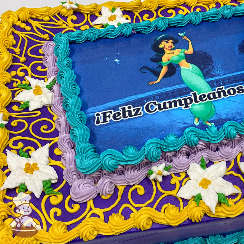 Sheet cake with yellow buttercream scrolls, white Stargazer lilies, and a blue and purple border around a printed photo layer.