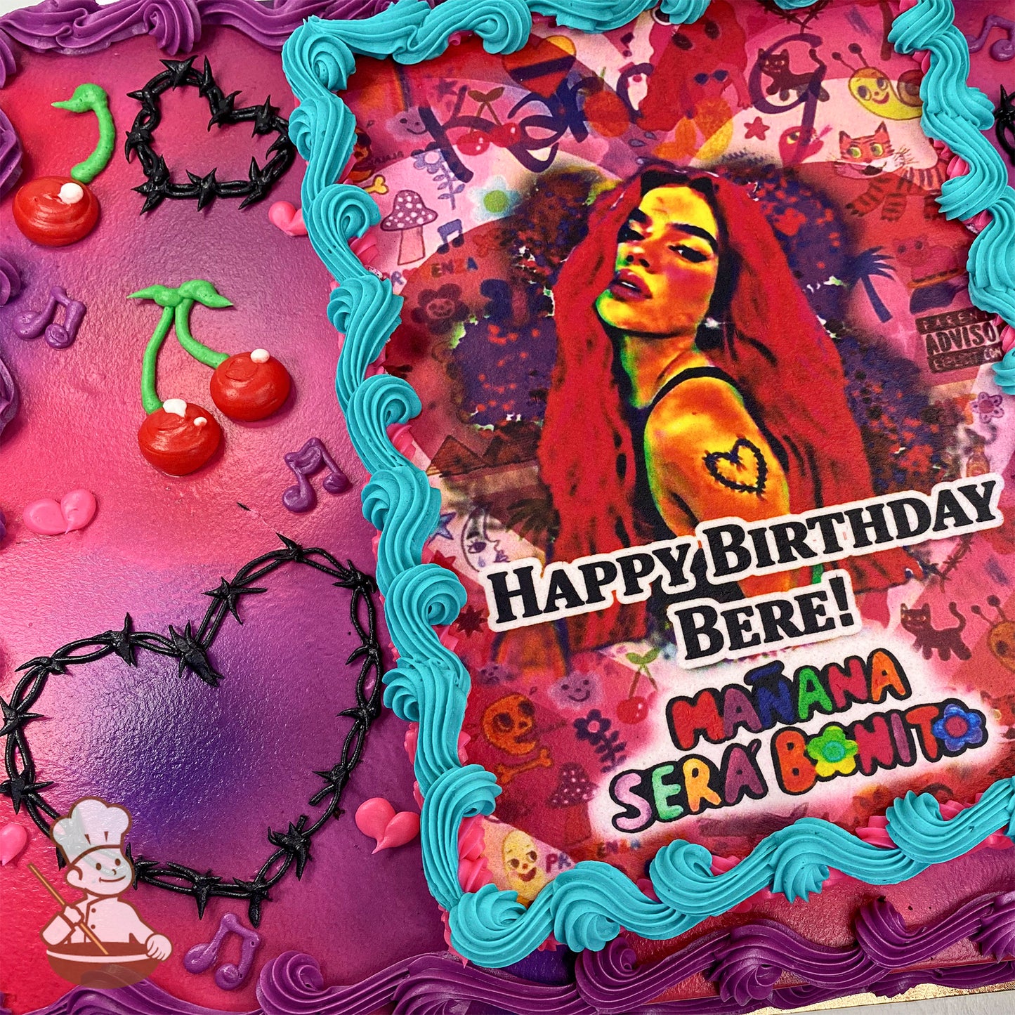 Sheet cake with pink and purple frosting, decorated with cherries, music notes, hearts, and a blue frosting border around a printed photo layer.