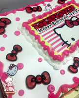 Sheet cake with pink and white buttercream borders, red and black Hello Kitty bows, small Hello Kitty faces, and pink buttercream dots.