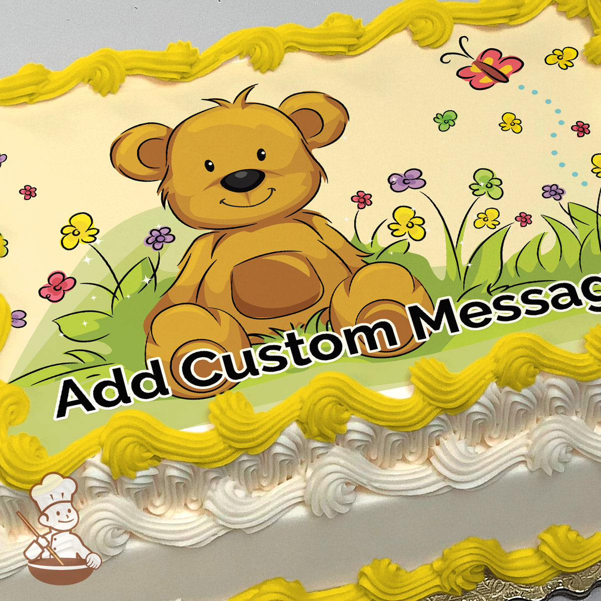 Cartoon teddy bear sitting on grass surrounded by colorful flowers and a flying butterfly against a light yellow background, printed on a sheet cake.