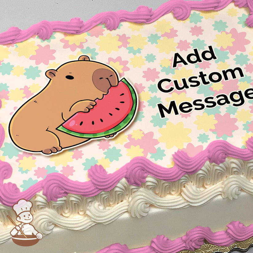 A cartoon capybara eating a slice of watermelon is centered on a pastel floral background. The image is printed on a photo sheet cake.