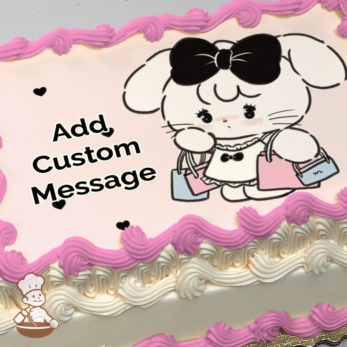 A cartoon bunny with a black bow, holding pink and blue shopping bags, on a light pink background with small black hearts, printed on a sheet cake.