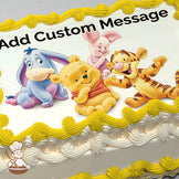 Cartoon illustration of Winnie the Pooh, Tigger, Piglet, and Eeyore sitting and smiling on a white background, printed on a photo sheet cake.