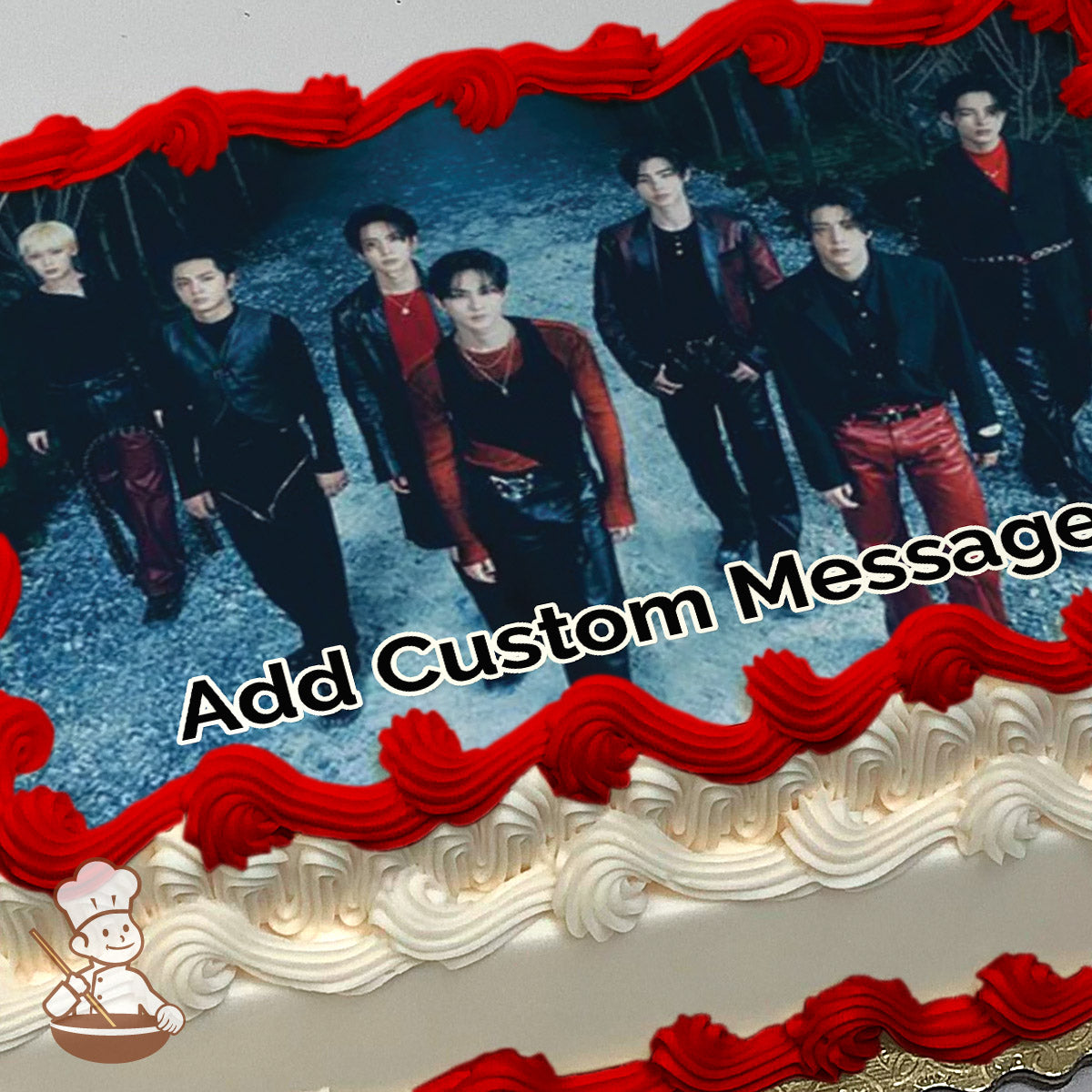 A group of seven people in dark, stylish outfits standing on a gravel path with trees in the background, printed on a photo sheet cake.