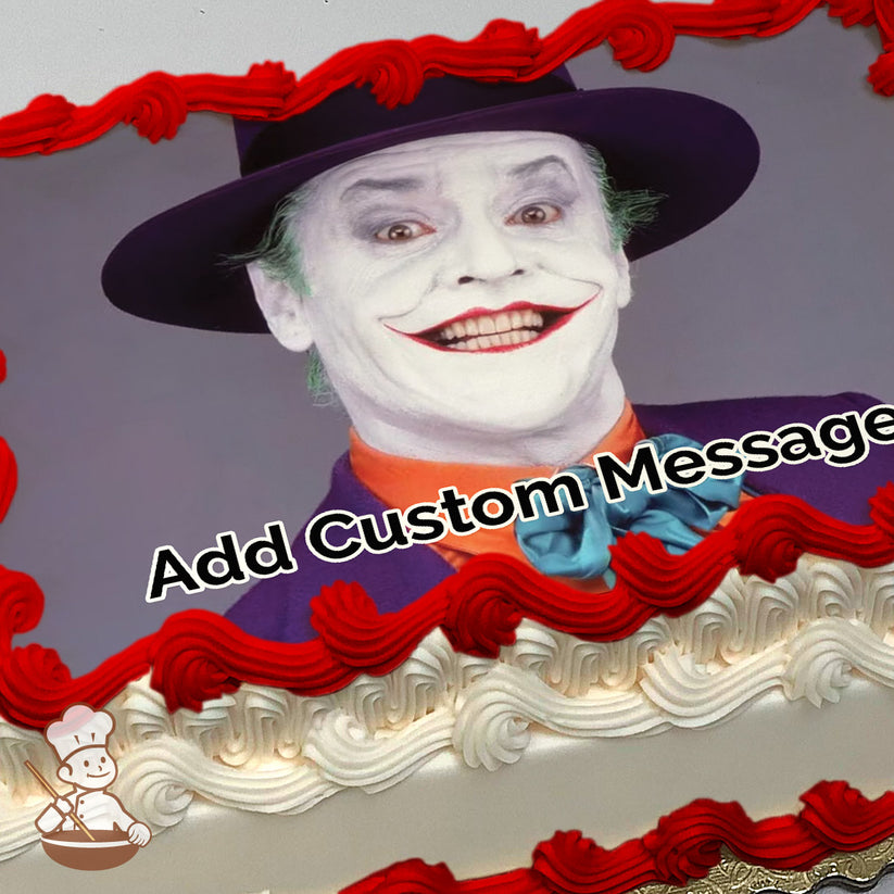 A cartoon character in a purple suit, orange shirt, teal bow tie, and dark hat against a solid gray background, printed on a photo sheet cake.