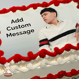 A person in a white sweater with black and red stripes reclines against a plain white background. Image printed on a photo sheet cake.