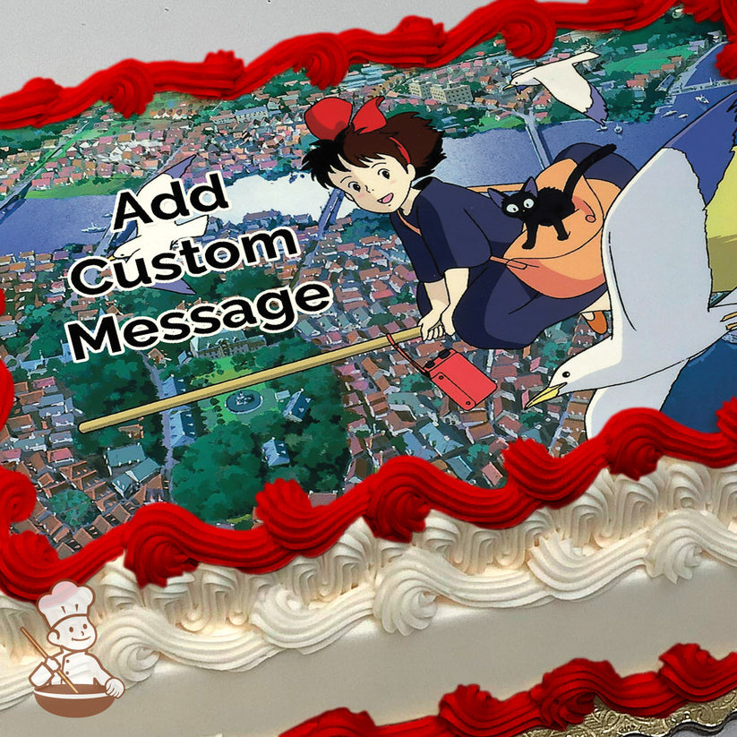 A cartoon girl with a red bow rides a broomstick with a black cat, flying over a detailed townscape with rooftops, trees, and water. Printed on a sheet cake.