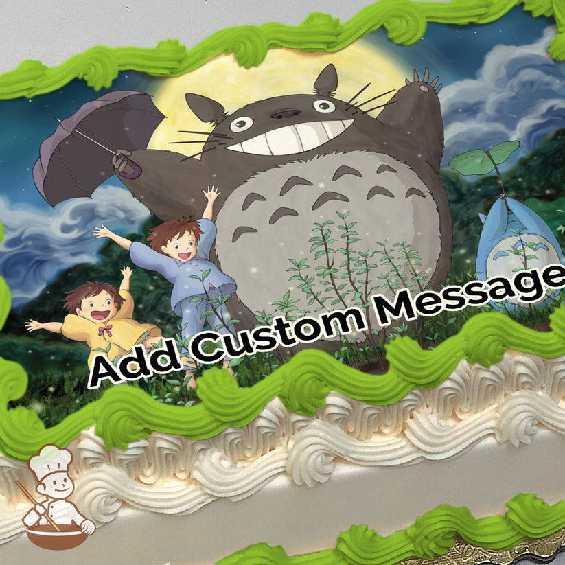 Cartoon image of Totoro with two children, Satsuki and Mei, joyfully jumping. Nighttime forest background with a full moon. Printed on a sheet cake.